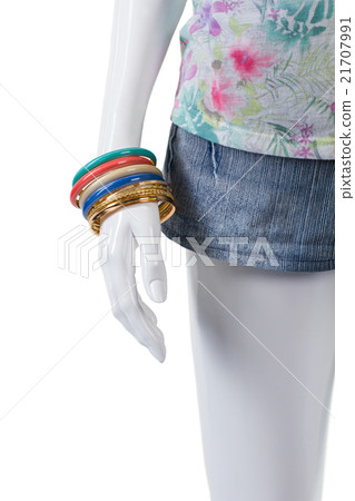 Denim shorts and colorful bracelets. Denim shorts and colorful bracelets. 21707991