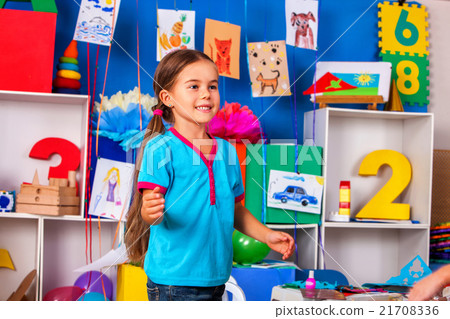 Girl playing in kindergarten. Girl playing in kindergarten. 21708336