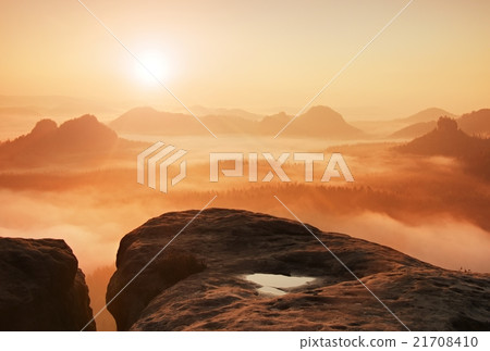 Fantastic dreamy sunrise on the top of mountain Fantastic dreamy sunrise on the top of mountain 21708410