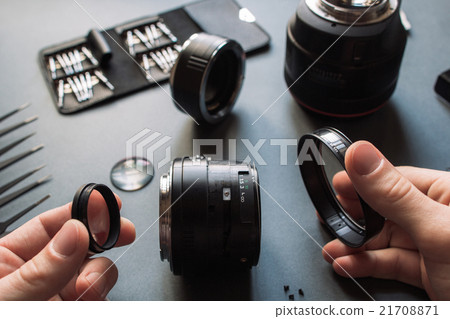 Photo camera lens repair set. Technician engineer 21708871