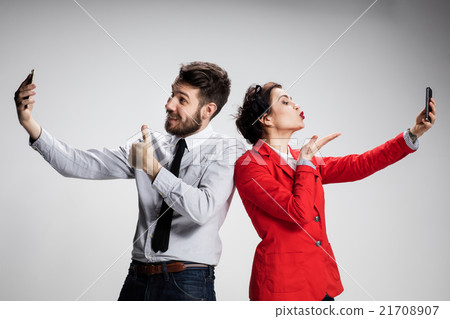 Business concept. The two young colleagues holding Business concept. The two young colleagues holding 21708907