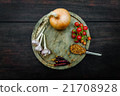 Condiments  for creative cooking on dark wooden  21708928