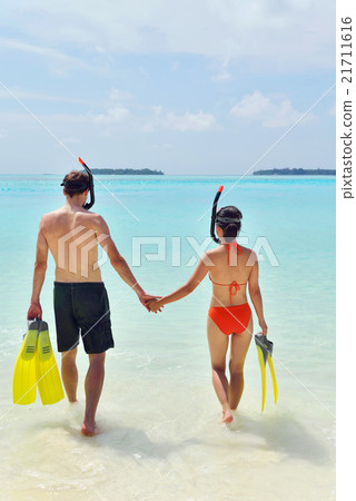 happy young couple have fun on beach happy young couple have fun on beach 21711616