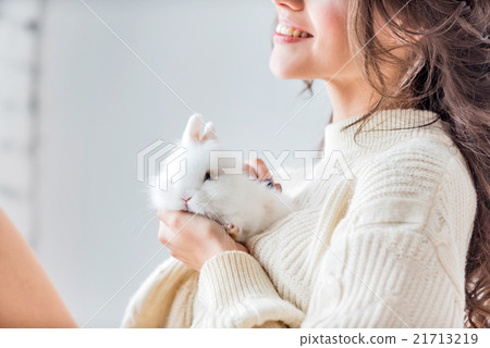 women with rabbit women with rabbit 21713219