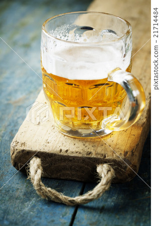 beer on wood background with copyspace 21714484
