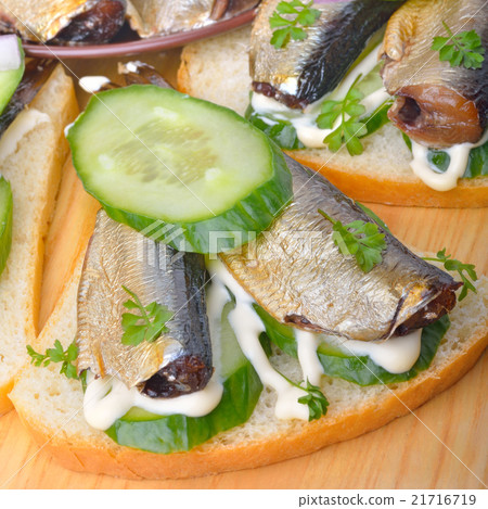 Appetizer with sprats, green cucumber 21716719