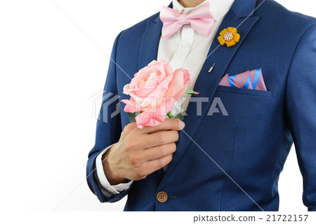 man in blue suit carry flowers 21722157