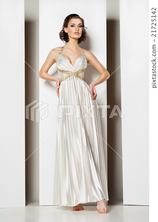 The beautiful young woman in a wedding dress 21725142