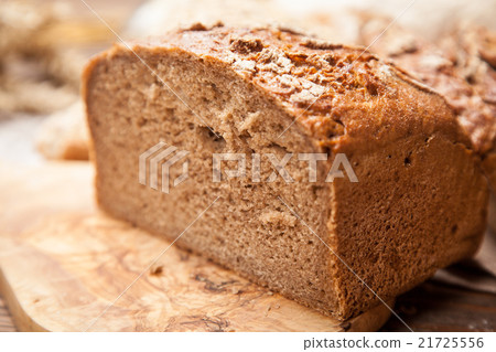 Bread assortment on wooden surface Bread assortment on wooden surface 21725556