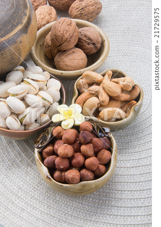 nuts. mixed nuts on the background 21729575