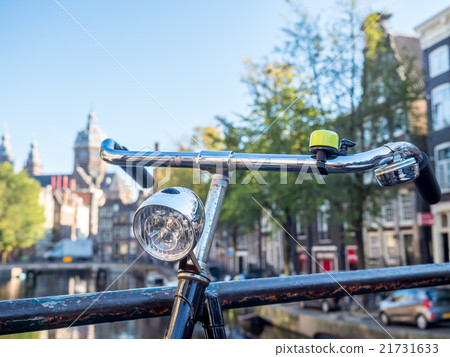 Saint Nicholas church in Amsterdam with bicycles 21731633