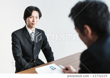 A man receiving an interview A man receiving an interview 21732225
