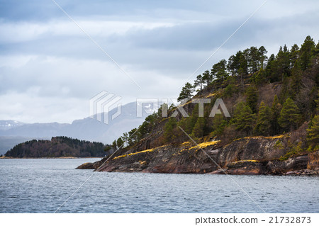 Landscape, sea and dark mountains, Norway 21732873