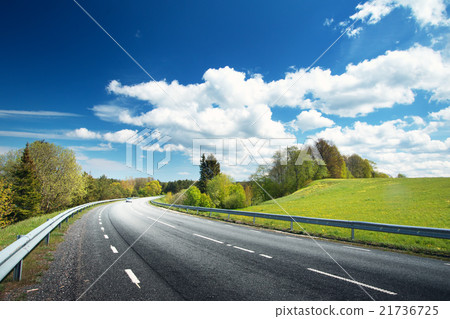 Car on asphalt road in beautiful spring day Car on asphalt road in beautiful spring day 21736725