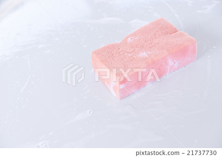 soaky pink sponge on a surface of car 21737730