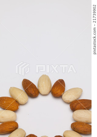 Almond nuts on the white table 21739902