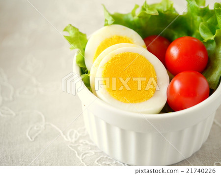Boiled egg and tomato salad (left space) 21740226