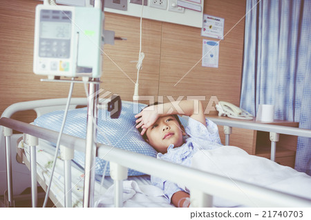 Asian boy with infusion pump intravenous IV drip. Asian boy with infusion pump intravenous IV drip. 21740703