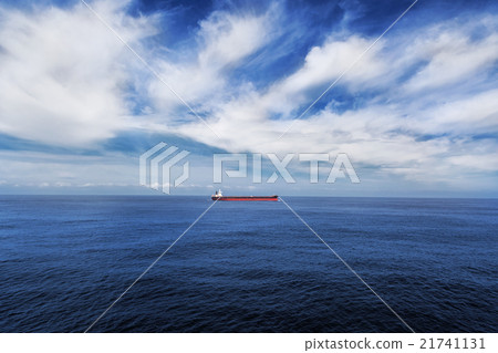 Cargo ship underway in the sea. 21741131