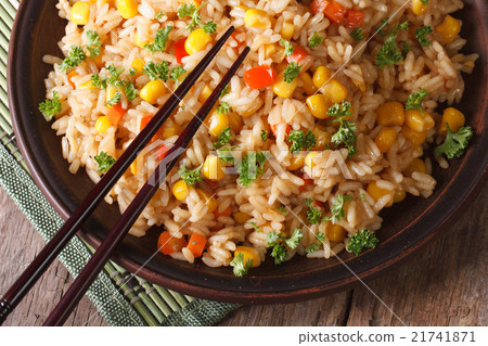 Asian fried rice with corn and eggs top view 21741871