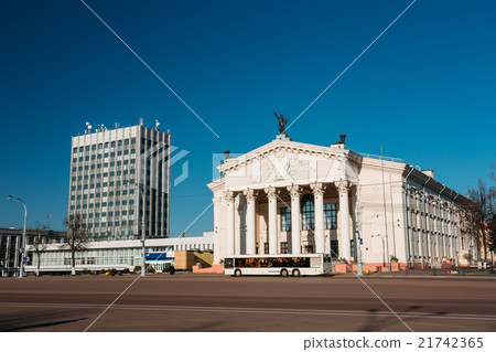 Bus Moving Along Street Near Building Of Gomel Bus Moving Along Street Near Building Of Gomel 21742365