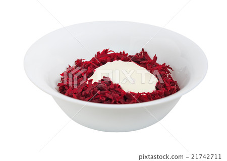 Grated beets with sour cream in a dish 21742711