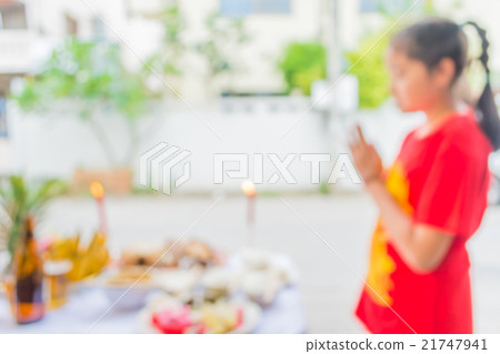 blur image of chinese new year food table blur image of chinese new year food table 21747941