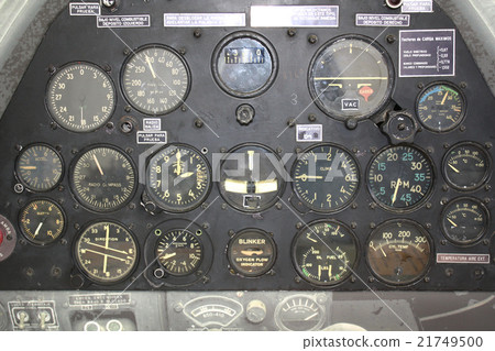 Retro control panel in a war plane cockpit Retro control panel in a war plane cockpit 21749500