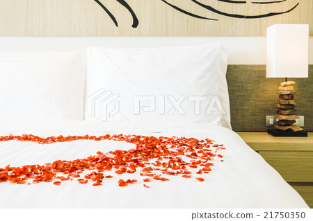 White pillow on bed White pillow on bed 21750350
