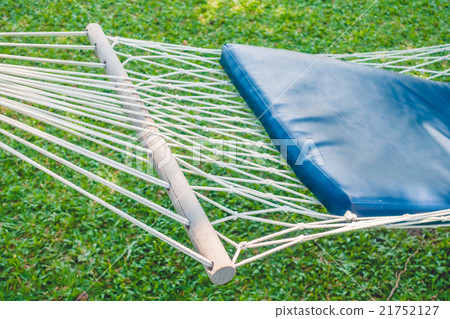 Empty hammock in the garden Empty hammock in the garden 21752127