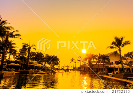 Beautiful Silhouette palm tree with umbrella and chair 21752153