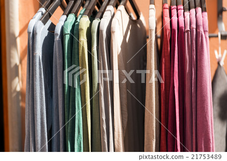 T-Shirts on Hangers at Market 21753489