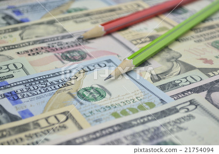 Pencil on dollar bank note money Pencil on dollar bank note money 21754094