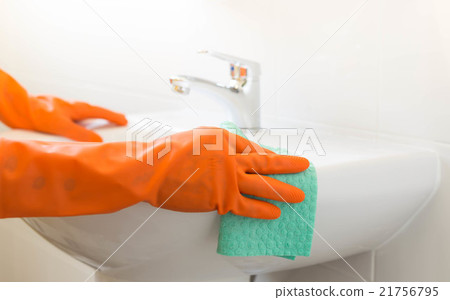 Woman clean a sink Woman clean a sink 21756795