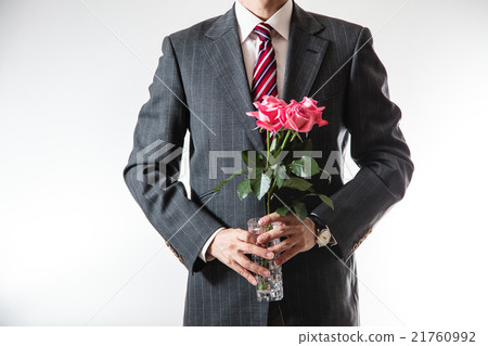 A businessman with flowers 21760992