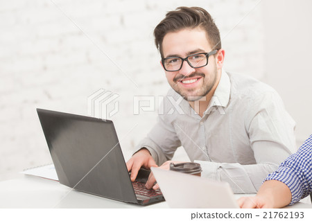 Businessman in office Businessman in office 21762193