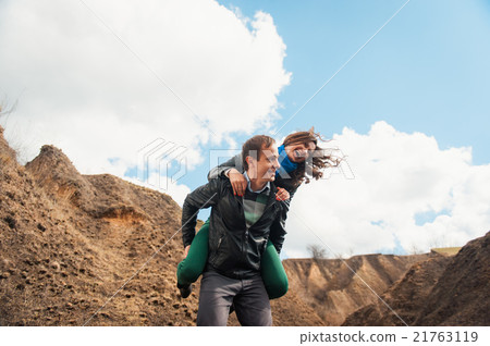 Happy couple smiling outdoors in the mountains 21763119