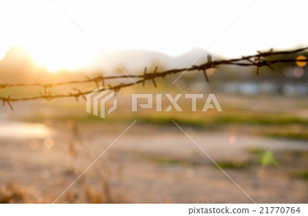 Blurred background old wire fence 21770764