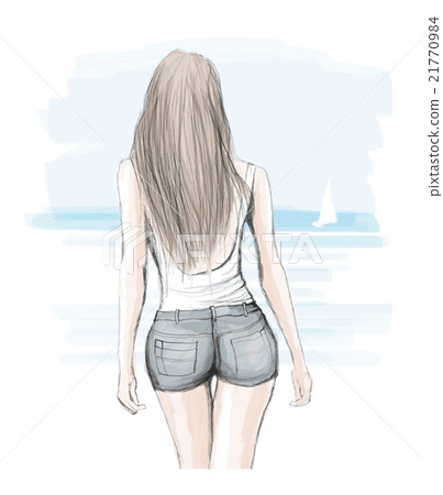 Young elegant woman walking on a beach Young elegant woman walking on a beach 21770984