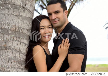 Happy interracial couple in love outdoor 21772834