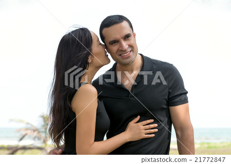 Happy interracial couple in love outdoor 21772847