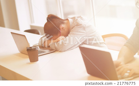 Tired freelance woman Tired freelance woman 21776775