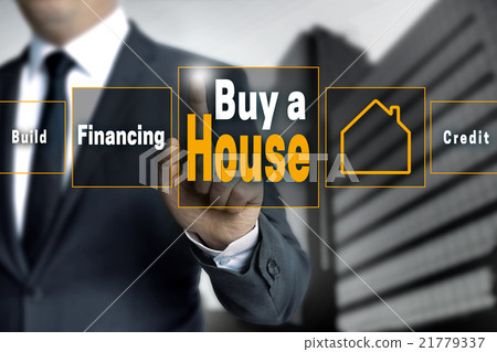 buy a house touchscreen is operated by businessman 21779337