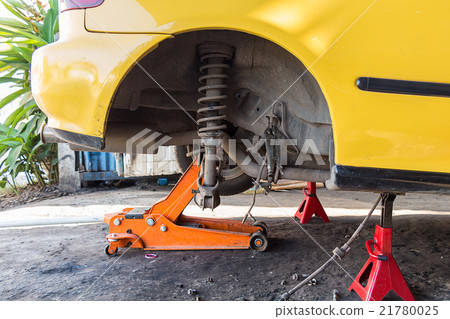 Car with a jack to lift the rear wheel for brake. Car with a jack to lift the rear wheel for brake. 21780025