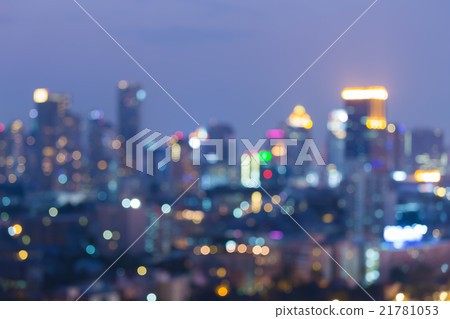 Night view blurred bokeh lights city downtown Night view blurred bokeh lights city downtown 21781053
