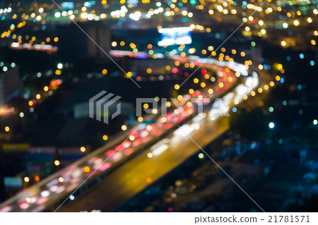 Blurred bokeh highway road curved night view Blurred bokeh highway road curved night view 21781571