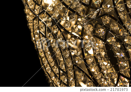 Noble chandelier in light candles dark background 21781973