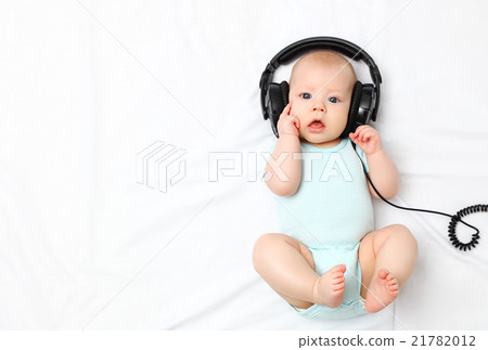 baby little boy in headphones 21782012