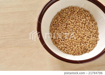 Mortar sesame grain wood grain background 21784786
