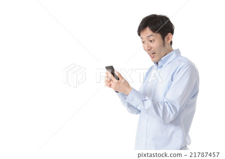 A man operating a smartphone A man operating a smartphone 21787457